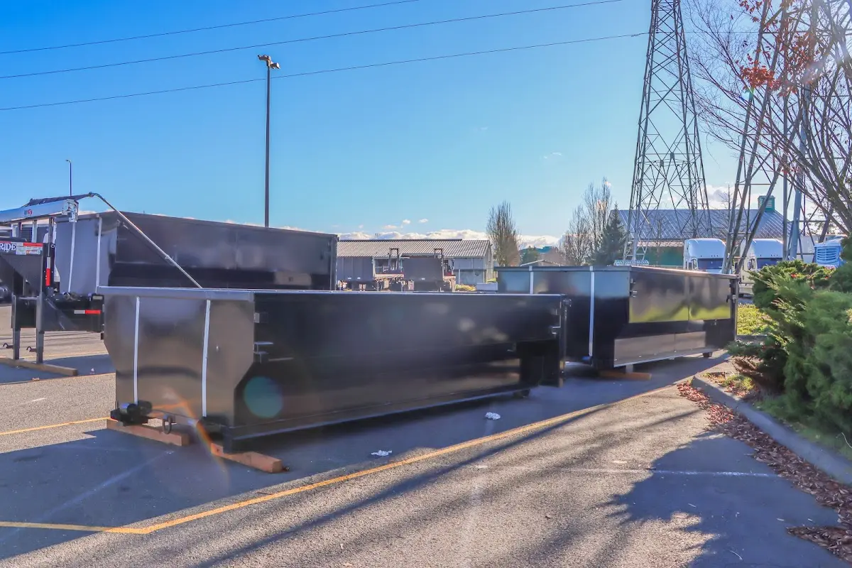 Roll-off dumpster ready for waste disposal at job site for 4 Yard Dumpster Rental in Spanaway